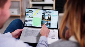 Image of homebuyers with laptop searching for homes