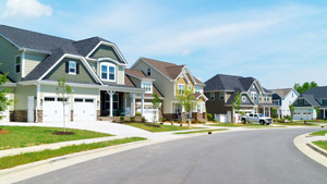 Image of homes in neighborhood on paved street