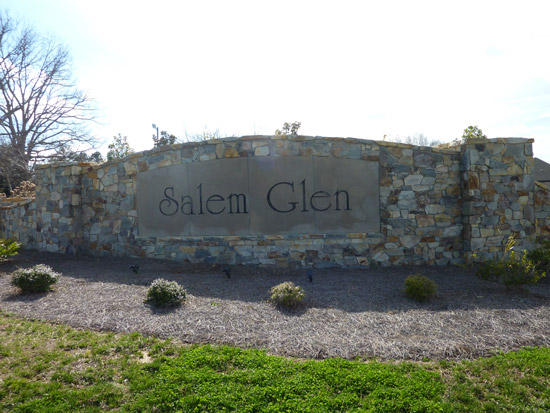 Stone sign with lettering stating Salem Glen