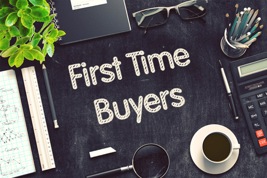 First Time Buyers sign on a desk