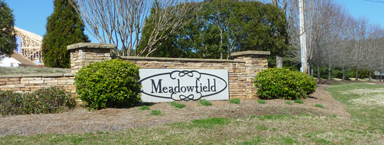 Entrance sign to Meadowfield Community