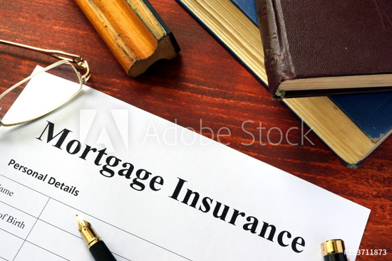 Mortgage Insurance Paper laying on desk with pen